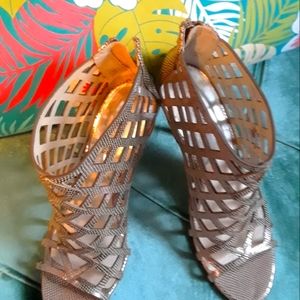 Michael kors gold leather 3inch heel. Gladiator style. Zipper at rear.  Size 8.5
